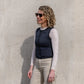 Adjustable 5kg weighted vest for women worn with casual clothing. Premium women's specific weighted vest with body contouring fit for comfort